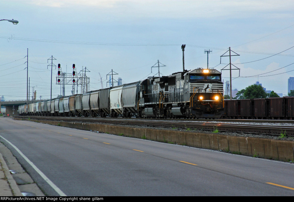 NS 6900 Lead a freight train out of the yard.